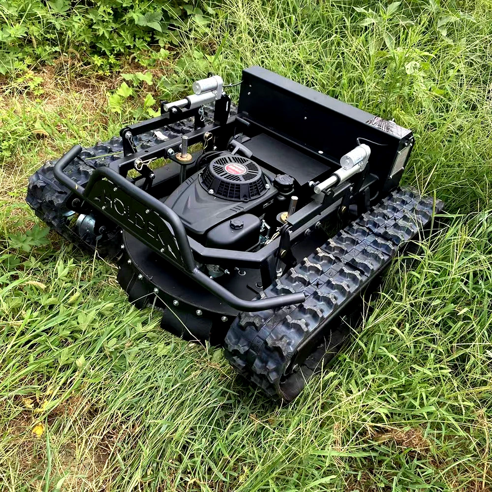 remote control tracked lawn mower cutting wet grass on slope without slipping