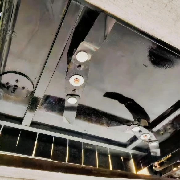 close-up of reinforced cutting blade system under a remote control crawler lawn mower